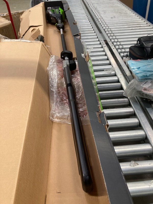 Photo 1 of ***(MISSING BATTERY & CHARGER, SELLING AS PARTS ONLY)*** Greenworks 82V 24" Brushless Cordless Fixed Mid Pole Hedge Trimmer,  (Great for Landscapers and Professionals)  ***(BOX RIPPED/TORN)***