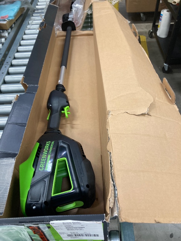 Photo 1 of ***(MISSING BATTERY & CHARGER, SELLING AS PARTS ONLY)*** Greenworks 82V 24" Brushless Cordless Fixed Mid Pole Hedge Trimmer,  (Great for Landscapers and Professionals)  ***(BOX RIPPED/TORN)***