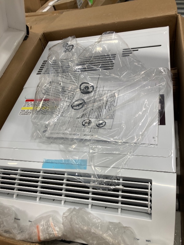 Photo 1 of ***BROKEN. USED FOR PARTS ONLY*** Profile AHTT08BC Clearview Air Conditioner 8,300, WiFi Enabled, Ultra Quiet for Medium Rooms up to 350 Sq. FT, Full Window View with Easy Installation, Flex-Depth Design, 8300 BTU, White