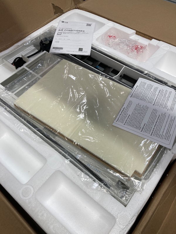 Photo 1 of *Broken. SELLING FOR PARTS ONLY* LG 12,000 BTU Dual Inverter Smart Window Air Conditioner, Cools 550 Sq. Ft., Ultra Quiet Operation, Up to 35% More Energy Savings, Energy Star, with LG ThinQ, Amazon Alexa and Hey Google, 115V