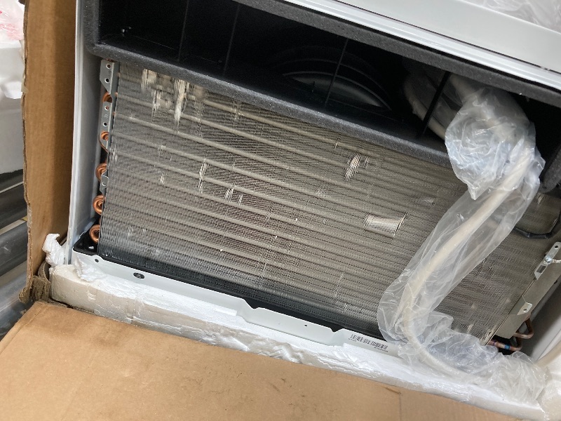 Photo 1 of *Broken. SELLING FOR PARTS ONLY* LG 12,000 BTU Dual Inverter Smart Window Air Conditioner, Cools 550 Sq. Ft., Ultra Quiet Operation, Up to 35% More Energy Savings, Energy Star, with LG ThinQ, Amazon Alexa and Hey Google, 115V