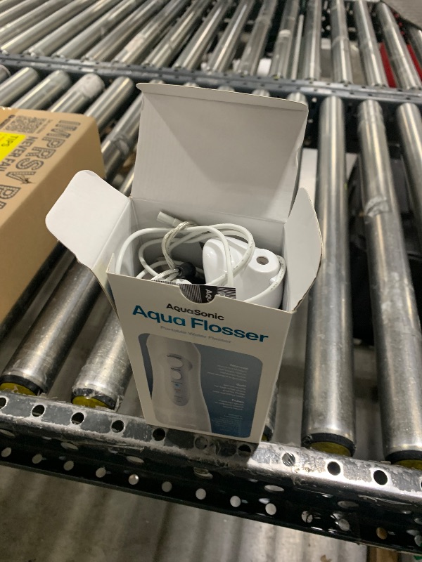 Photo 1 of AquaSonic Water Flosser - Cordless Rechargeable Water Flossers for Teeth Cleaning