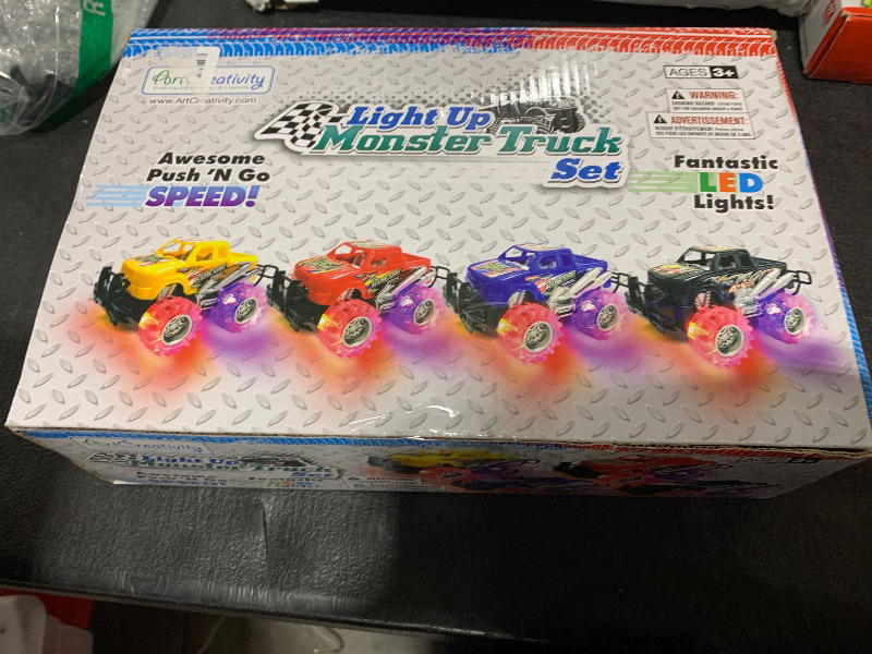 Photo 1 of ArtCreativity Light Up Monster Trucks for Boys and Girls, 4-Pack Toy Truck Set, Monster Trucks for Boys 3 4 5 6 7 8 Years Old, Toddler Monster Truck Toys, Light Up Trucks
