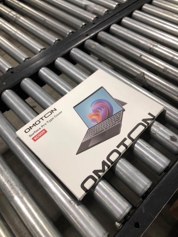 Photo 2 of OMOTON Bluetooth Keyboard Compatible with Microsoft Surface Pro 7/7+/6/5/4/3, Ultra-Slim Keyboard Type Cover with Touchpad, 7 Colors Backlit, Rechargeable and Wireless, Grey