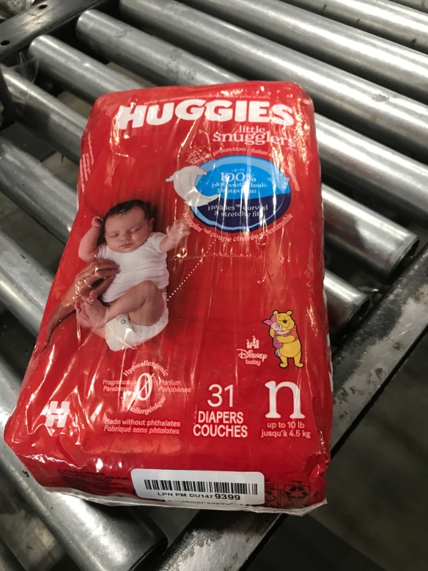 Photo 1 of Huggies Newborn Diapers, Little Snugglers Baby Diapers, Size Newborn (up to 10 lbs), 31 Count
