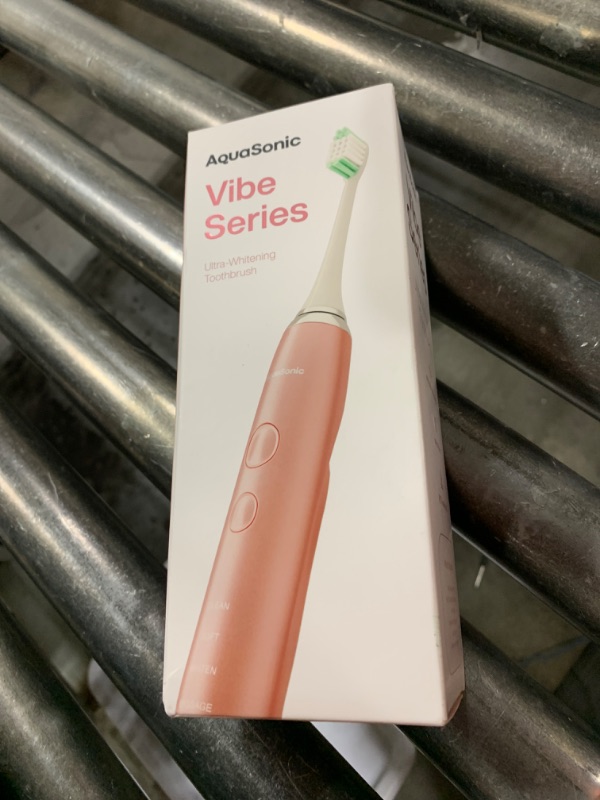 Photo 1 of Aquasonic Vibe Series Ultra-Whitening Toothbrush – ADA Accepted Electric Toothbrush - 8 Brush Heads & Travel Case – 40,000 VPM Motor & Wireless Charging - 4 Modes w Smart Timer – Satin Rose Gold
