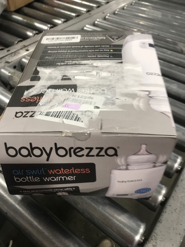 Photo 1 of Baby Brezza AirSwirl Waterless Baby Bottle Warmer - Safely Warm Breastmilk + Formula - Bottles Stay Dry + Nutrients are Protected - Works with Nearly All Bottles