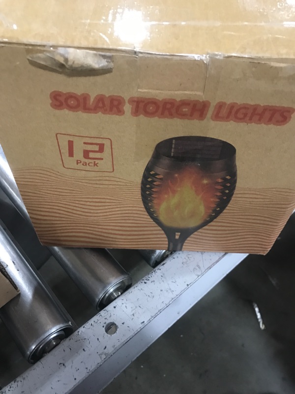 Photo 1 of KYEKIO Solar Torch Light with Flickering Flame, 12Pack Solar Lights Outdoor, Waterproof Outdoor Lights for Yard Garden, Luces Solares para Exteriores, Torches Lighting for Outside Patio Decorations