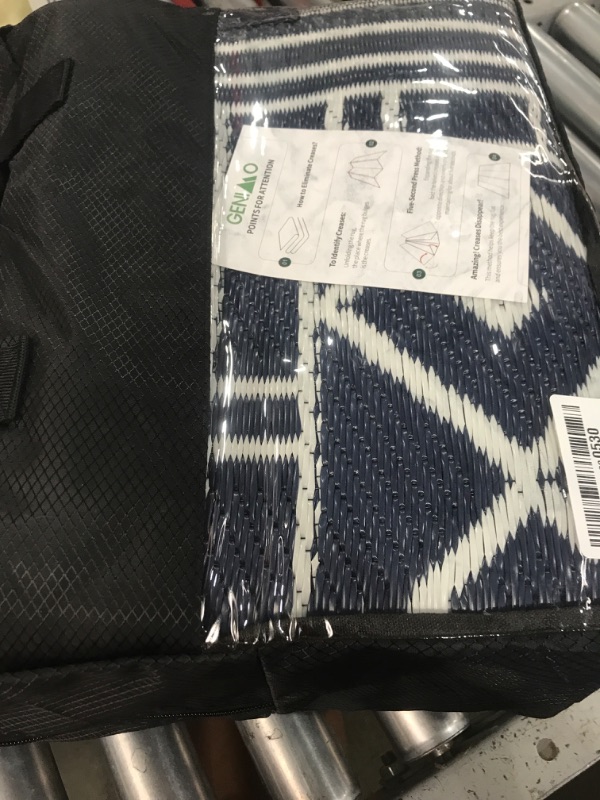 Photo 1 of GENIMO Outdoor Rug Waterproof for Patio Decor, 6'x9' Foldable Reversible Plastic Straw Carpet for Travel Trailers, Outside Area Mat for Rv, Deck, Picnic, Porch, Camper, Balcony, Beach, Blue & White