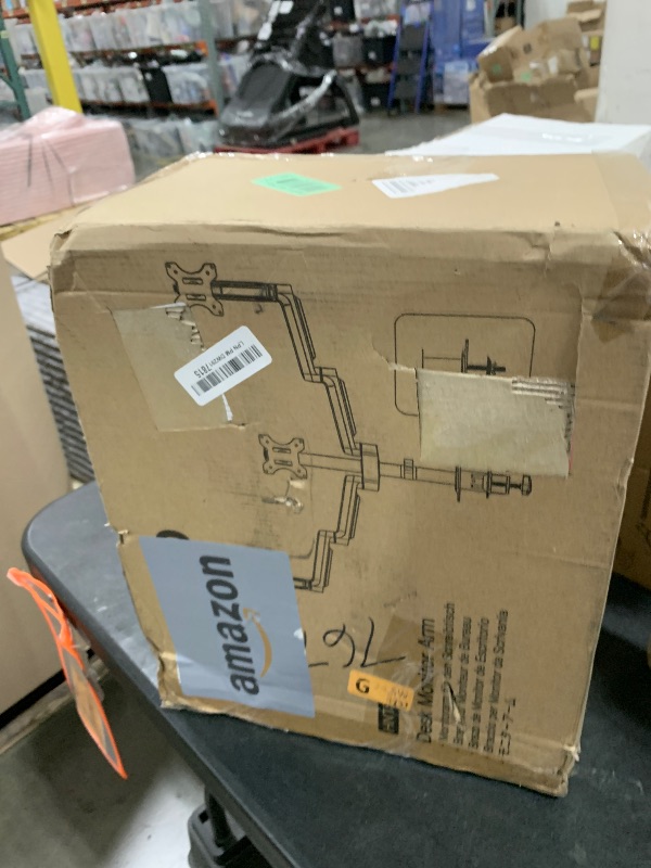Photo 1 of HUANUO Triple Monitor Mount for 13-27 inch Computer Screens, 3 Monitor Desk Mount with Gas Springcore Arm Holds 17.6lbs, Triple Monitors Stand with Tilt, Swivel, Rotation, VESA 75x75, 100x100mm