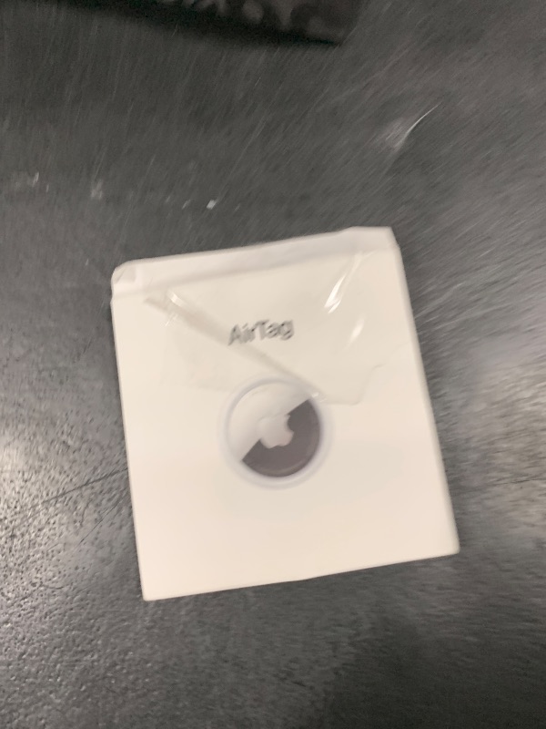 Photo 1 of Apple AirTag. Keep Track of and find Your Keys, Wallet, Luggage, Backpack, and More. Simple one-tap Set up with iPhone or iPad