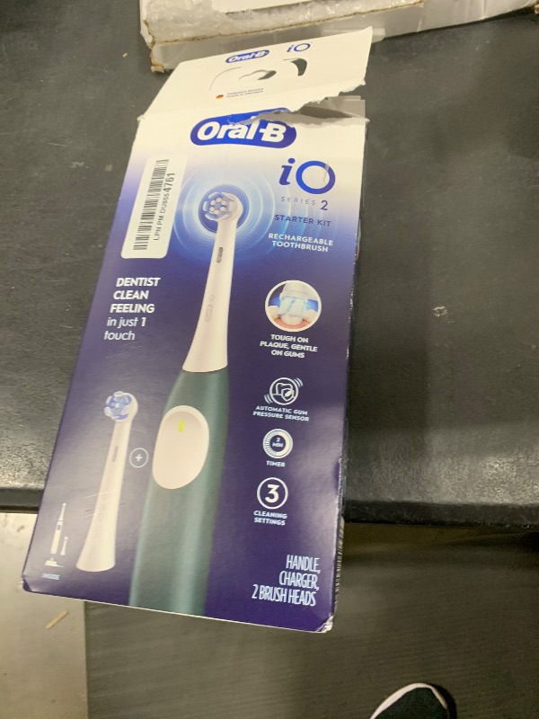 Photo 1 of Oral-B iO Series 2 Rechargeable Electric Powered Toothbrush Starter Kit, Forest Green with 2 Brush Heads - Automatic Pressure Sensor to Protect Gums - 3 Modes - 2 Min Timer
