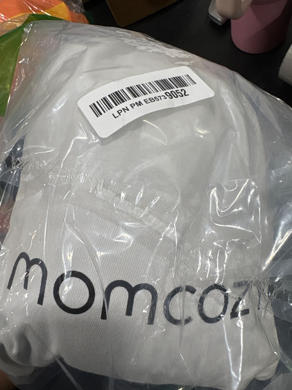 Photo 1 of Momcozy Baby Wrap Carrier, Easy to Wear Infant Carrier Slings, Lightweight Hands Free Baby Sling, Adjustable Baby Carriers for Newborn to Toddler 8-35 lbs, Black
