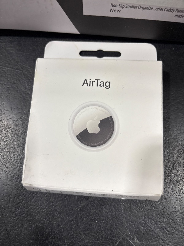 Photo 1 of Apple AirTag. Keep Track of and find Your Keys, Wallet, Luggage, Backpack, and More. Simple one-tap Set up with iPhone or iPad