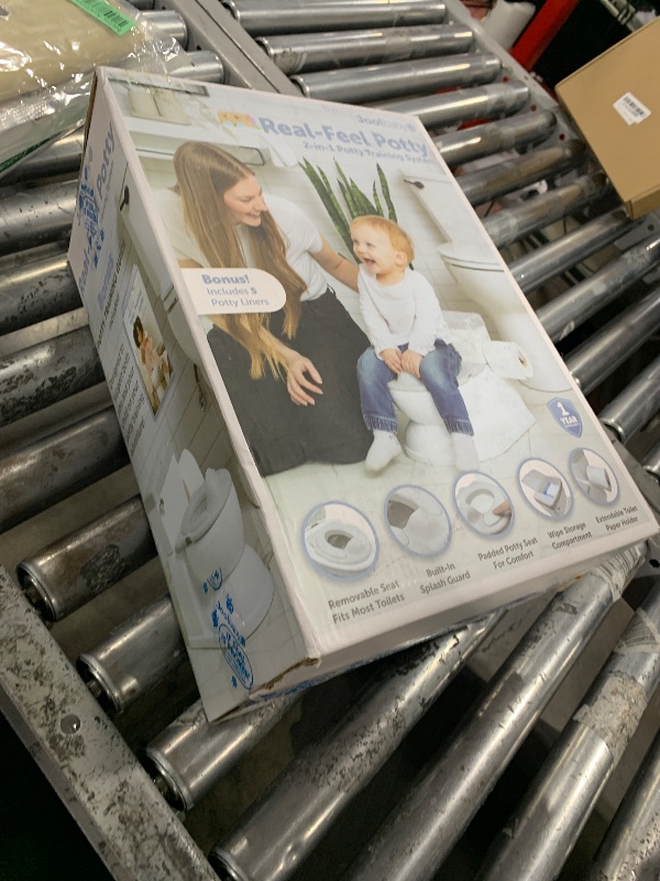Photo 1 of Real Feel 2-in-1 Potty with Wipes Storage, Flushing Sounds & Disposable Liners - Realistic Toilet - Easy to Clean & Assemble - Jool Baby (Gray)