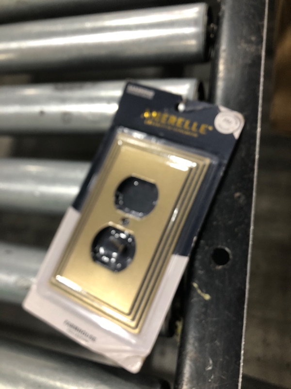 Photo 1 of Amerelle Steps Single Duplex Cast Metal Wallplate in Rustic Brass Cast