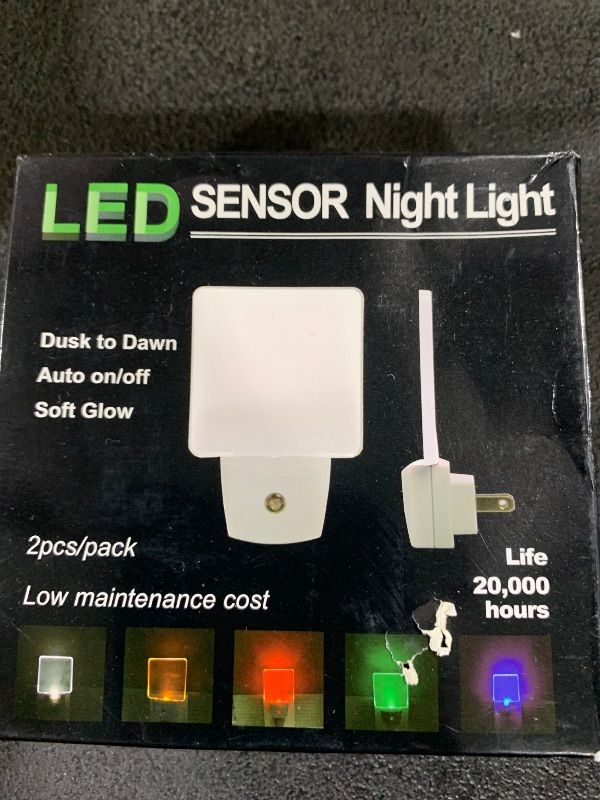 Photo 1 of 0.5W Plug in Dusk to Dawn Light Sensor Auto on/Off LED Night Light Wall Light 2-Pack Amber/Yellow Glow