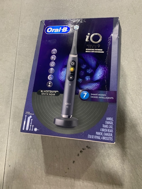 Photo 1 of Oral-B iO Series 9 Electric Toothbrush with 3 Replacement Brush Heads, Black Onyx