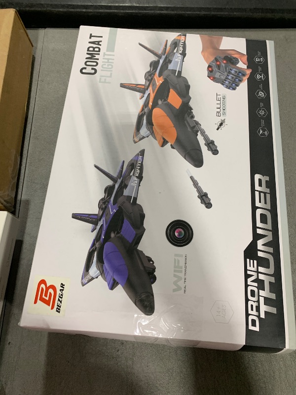 Photo 1 of BEZGAR RC Plane for Kids | 2.4GHZ Brushless Drones with Camera, 6-axis Gyro Remote Control Airplane, 360° Flip Fighter Jet Toy, Toys for ages 8-13 with Colorful LED Navigation Lights Blue