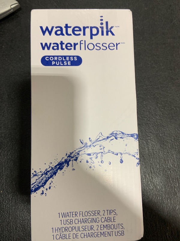 Photo 1 of Waterpik Cordless Pulse Rechargeable Portable Water Flosser for Teeth, Gums, Braces Care and Travel with 2 Flossing Tips, Waterproof, ADA Accepted, WF-20 Blue, Packaging May Vary