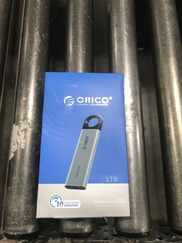 Photo 1 of ORICO 1TB External SSD Up to 1050MB/s, Hanging Hole Design Portable Solid State Drive, USB C&A 2 in 1 Cable, Reliable Storage for Type-C Smartphone, Tablets, Laptops - C10