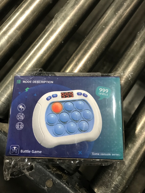 Photo 1 of Intoypad Pop Game Light Up Fidget Toy for Kids, 6 Modes LED Screen Quick Push Pop Game Controller Electric Fidget Popper Game Quick Push Bubble Game Birthday Toys for Kids Lightblue