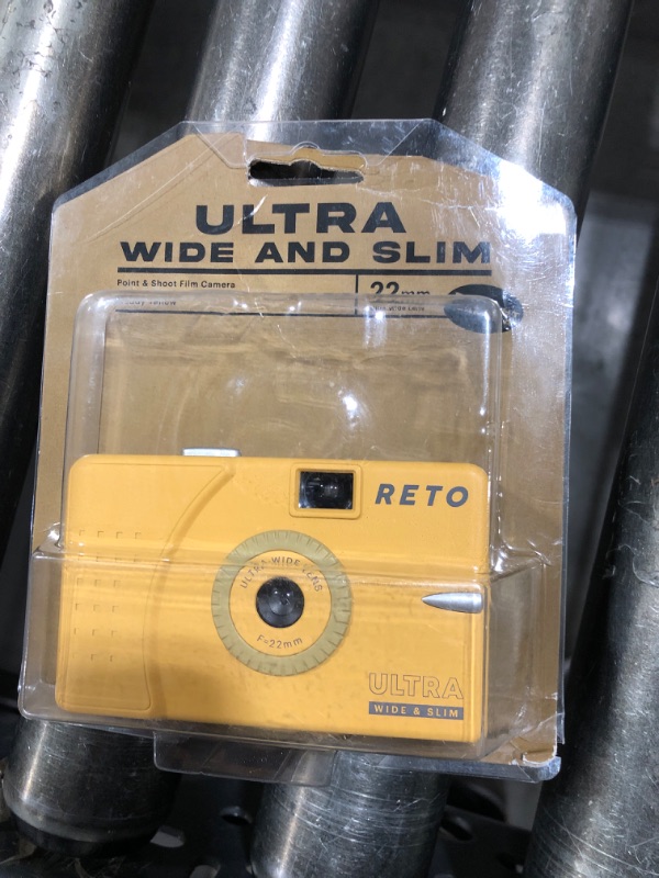 Photo 1 of RETO Ultra Wide and Slim 35mm Reusable Daylight Film Camera - 22mm Wide Lens, Focus Free, Light Weight, Easy to Use (Muddy Yellow)