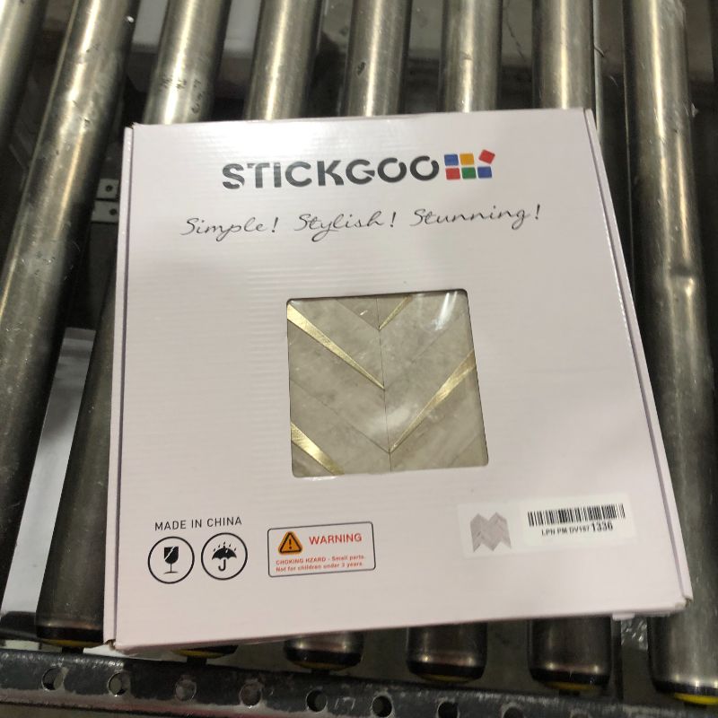 Photo 1 of STICKGOO 10-Sheet Herringbone Tile Peel and Stick Backsplash, Beige Mixed Metal Gold PVC Stick on Backsplash, Self Adhesive Wall Tile for Kitchen and Bathroom