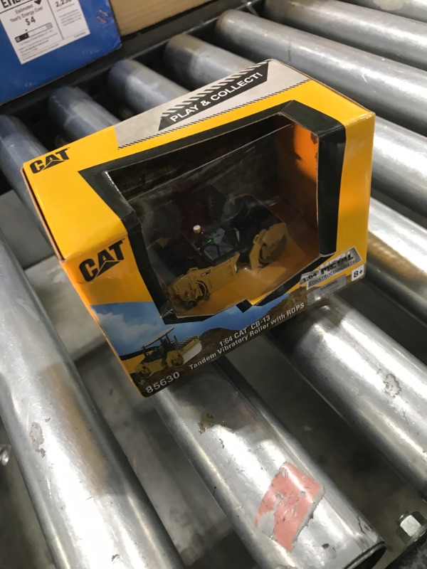 Photo 1 of Diecast Masters 1:87 Scale Caterpillar 972M Wheel Loader with Log Fork | HO Scale Series Cat Trucks & Construction Equipment Model 85950