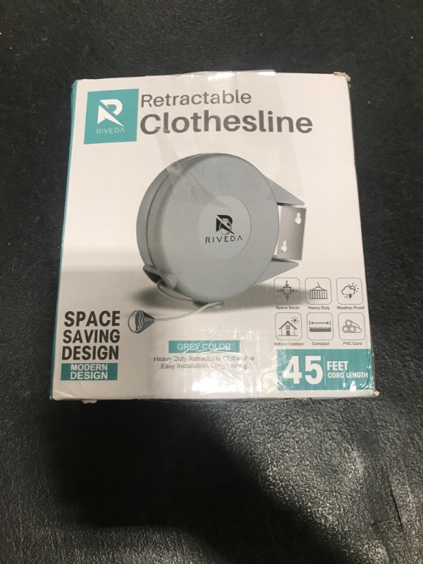 Photo 1 of Retractable Clothesline - Portable Heavy Duty Indoor and Outdoor Washing Line - 40 Feet PVC Retracting Clothes Line with Wall Mount Hang The Wet Dry Clothing Laundry - Easy Installation (Grey)