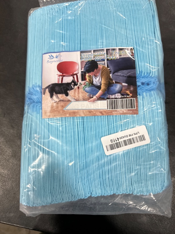 Photo 1 of Disposable Puppy Training Pads 100 Count Pee Pads for Dogs, Cats, Rabbits and Guinea Pigs Waterproof Super Absorbent Odour Locking 13” x 18”