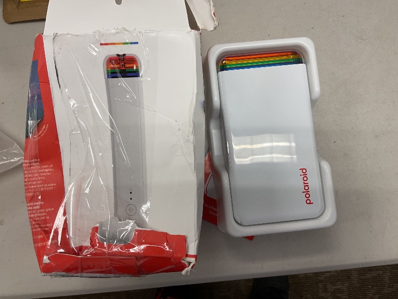 Photo 1 of Polaroid Hi-Print - Bluetooth Pocket Photo Printer + Paper Double Pack Bundle (40 Sheets)