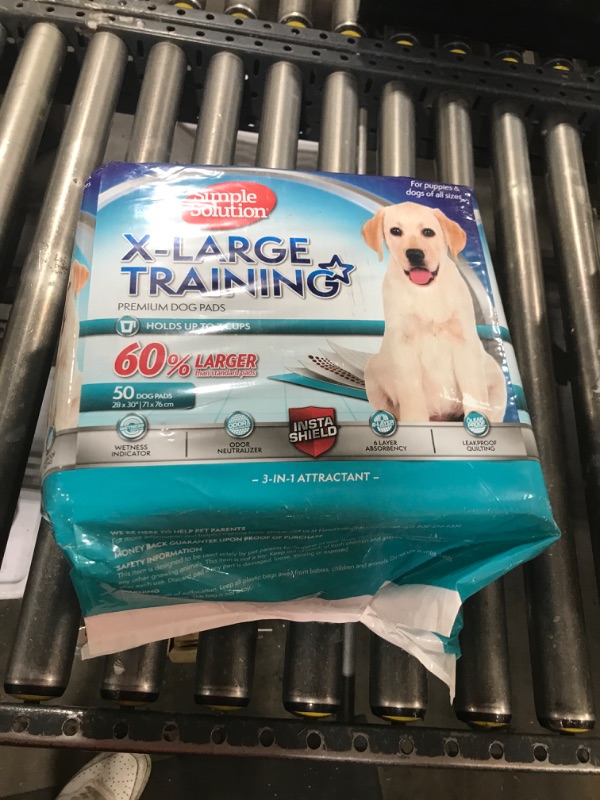Photo 1 of Simple Solution Extra Large Dog Training and Puppy Pads, Extra Large - 50-Count
