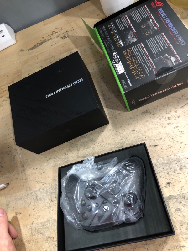 Photo 1 of ASUS ROG Raikiri Pro OLED Display, tri-Mode connectivity, remappable Buttons&triggers, 4 Rear Buttons, Step&Linear triggers, Adjustable Joystick Sensitivity, 3.5mm Jack with ESS DAC, for PC and Xbox