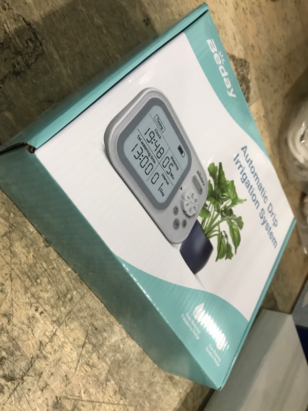 Photo 1 of Automatic Plant Waterer Indoor Self Watering System for 15 Potted Plants, Auto Drip Irrigation Kit Programmable Water Timer with Smart Humidity Detection