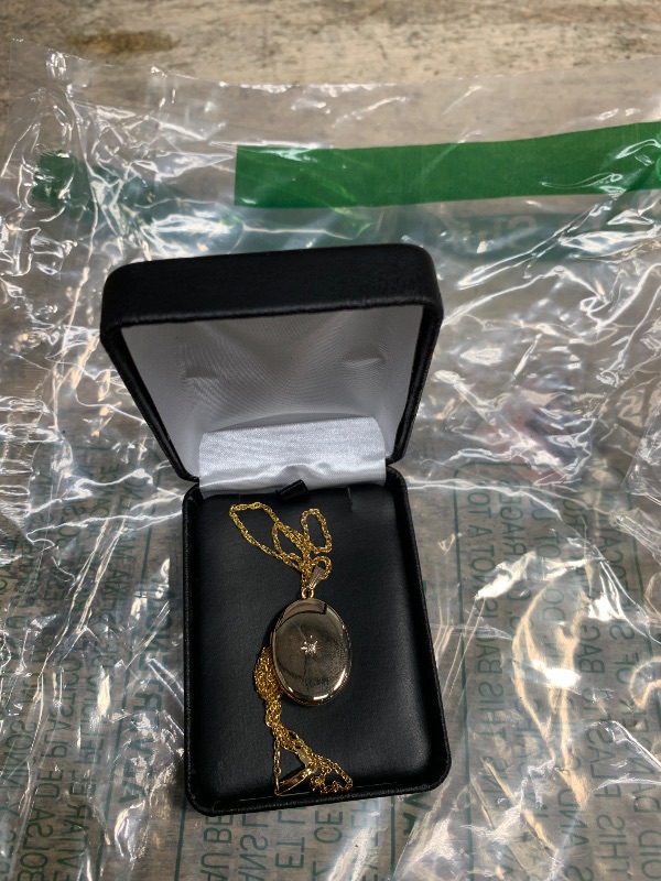 Photo 1 of Amazon Essentials 14k Yellow Gold-Filled Oval Locket with Diamond-Accent, 20" (previously Amazon Collection)