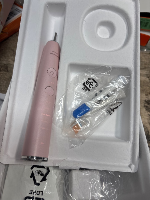 Photo 1 of Philips Sonicare DiamondClean Smart 9500 Electric Toothbrush, Sonic Toothbrush with App, Pressure Sensor, Brush Head Detection, 5 Brushing Modes and 3 Intensity Levels, Pink, Model HX9923/21