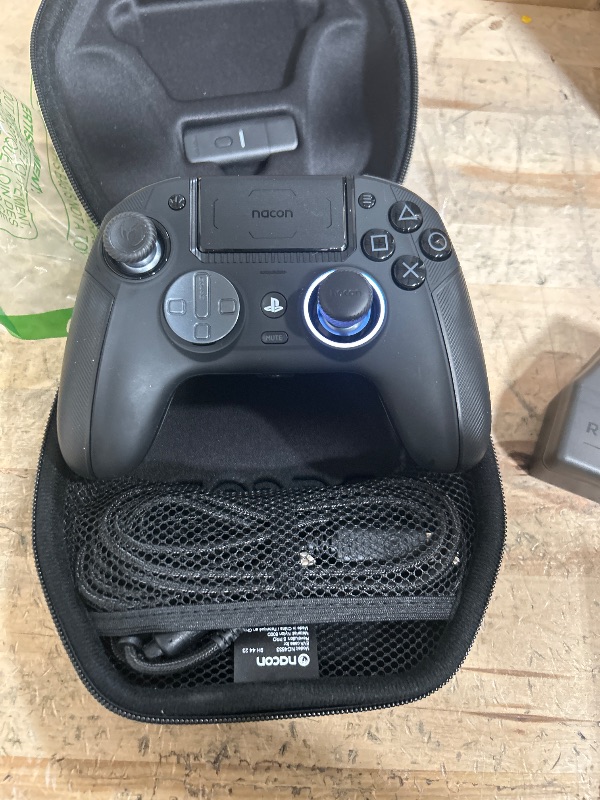 Photo 1 of NACON Revolution 5 Pro Officially Licensed PlayStation Wireless Gaming Controller for PS5 / PS4 / PC - Hall Effect, Trigger Stops, Mappable Buttons, Bluetooth Audio - Triple Black