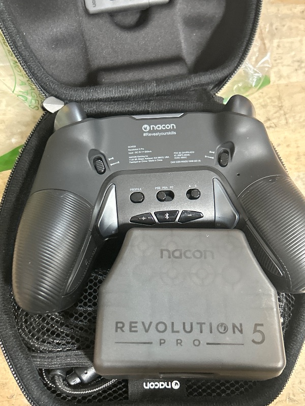 Photo 1 of NACON Revolution 5 Pro Officially Licensed PlayStation Wireless Gaming Controller for PS5 / PS4 / PC - Hall Effect, Trigger Stops, Mappable Buttons, Bluetooth Audio - Triple Black