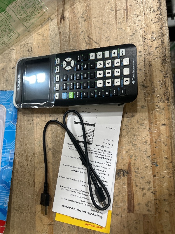 Photo 1 of Texas Instruments TI-84 Plus CE Color Graphing Calculator, Black