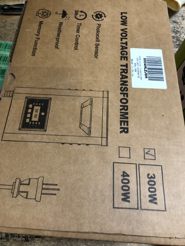 Photo 1 of 300W Low Voltage Landscape Transformer, Landscape Lighting Transformer with Timer and photocell Sensor, 120V AC to 12V/14V AC Outdoor Weatherproof Low Voltage Transformers for Landscape Lighting