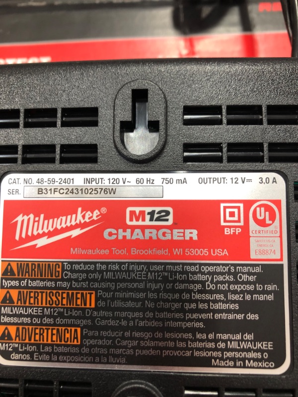 Photo 1 of -Milwaukee Heavy Duty (FUEL Tool Bag). Fits (1-2 Tool Kit) 2760-20, 2866-22, 2866-20, Fuel Screwgun and other Cordless Tools alike
-Milwaukee Genuine OEM 48-59-2401 M12 Lithium Ion 12 Volt Battery Charger w/LED Indicating, Red
-Milwaukee 48-11-2440 M12 RE