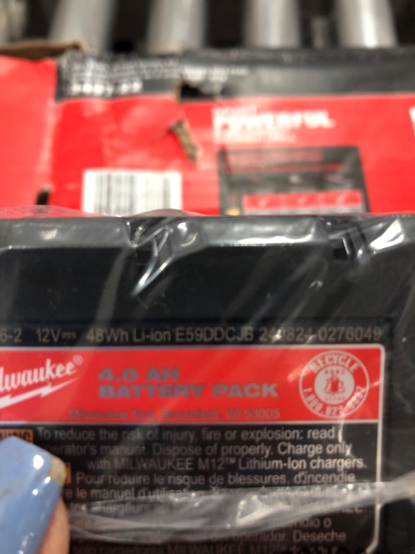 Photo 1 of -Milwaukee Heavy Duty (FUEL Tool Bag). Fits (1-2 Tool Kit) 2760-20, 2866-22, 2866-20, Fuel Screwgun and other Cordless Tools alike
-Milwaukee Genuine OEM 48-59-2401 M12 Lithium Ion 12 Volt Battery Charger w/LED Indicating, Red
-Milwaukee 48-11-2440 M12 RE