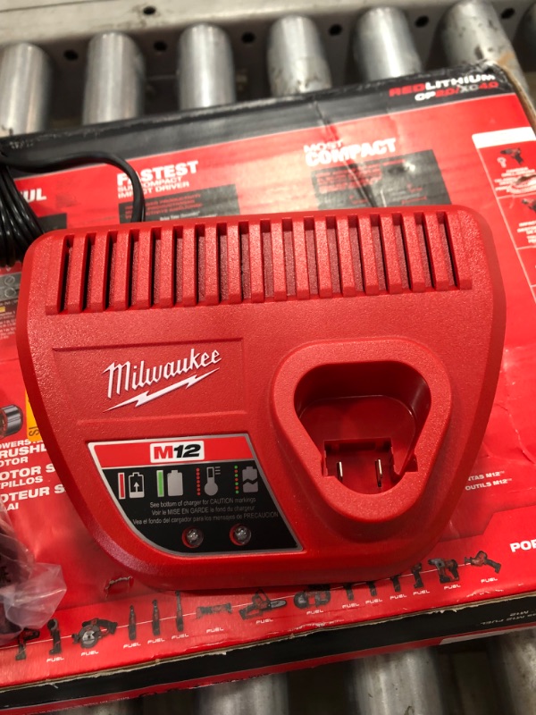 Photo 1 of -Milwaukee Heavy Duty (FUEL Tool Bag). Fits (1-2 Tool Kit) 2760-20, 2866-22, 2866-20, Fuel Screwgun and other Cordless Tools alike
-Milwaukee Genuine OEM 48-59-2401 M12 Lithium Ion 12 Volt Battery Charger w/LED Indicating, Red
-Milwaukee 48-11-2440 M12 RE