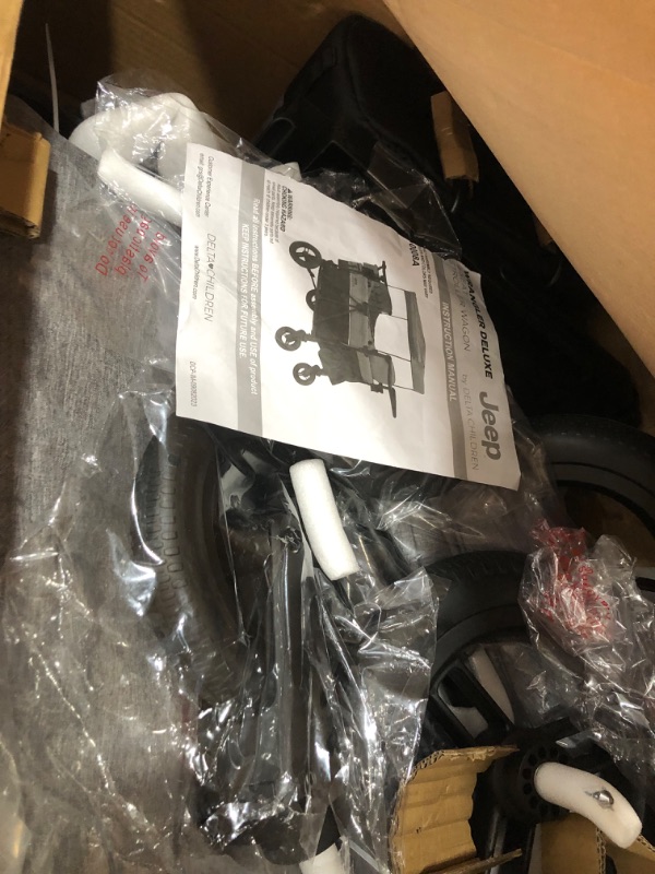 Photo 1 of ****BROKEN, MISSING PIECES**** 
Jeep Wrangler Deluxe 4 Seater Stroller Wagon by Delta Children - Premium Quad Stroller Wagon for 4 Kids with Convertible Seats, Adjustable Push/Pull Handles, Removable Canopy & Flat Fold, Grey
