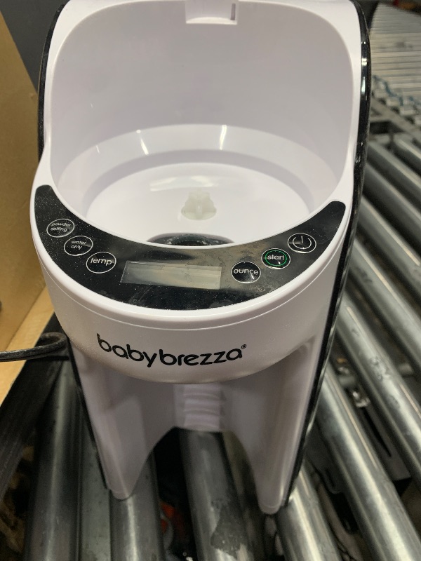 Photo 1 of Baby Brezza New and Improved Formula Pro Advanced Formula Dispenser Machine - Automatically Mix a Warm Formula Bottle Instantly - Easily Make Bottle with Automatic Powder Blending, White