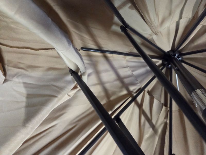 Photo 1 of ***DAMAGED - ONE OF THE UMBRELLA LIMBS IS BROKEN - SEE PICTURES***
Blissun 9' Outdoor Patio Umbrella, Outdoor Table Umbrella, Yard Umbrella, Market Umbrella with 8 Sturdy Ribs, Push Button Tilt and Crank (Tan)
