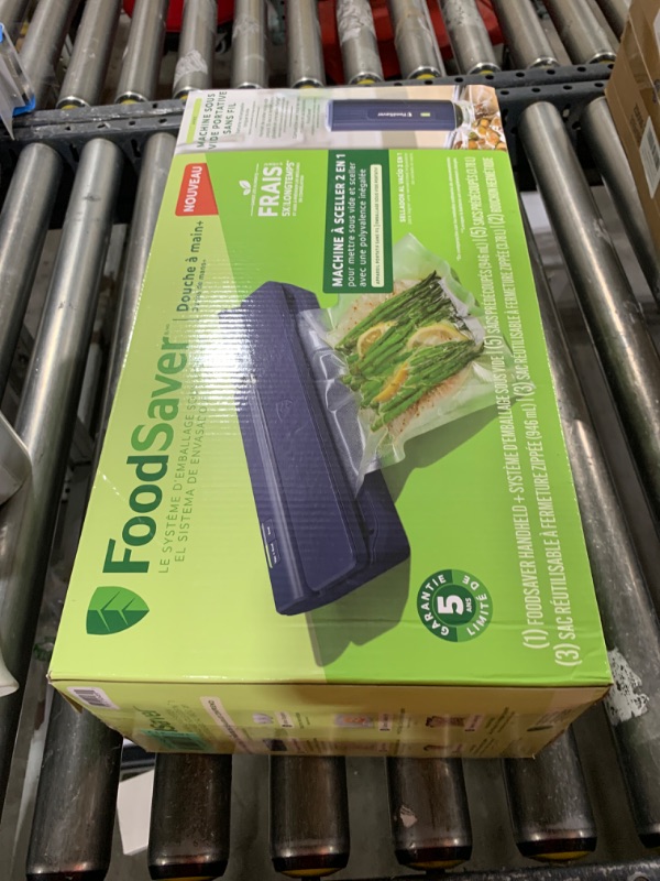 Photo 1 of FoodSaver® Handheld+ 2-in-1 Vacuum Sealing System, Handheld and Countertop Vacuum Sealer, Matte Indigo Blue
