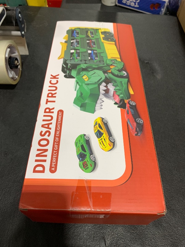 Photo 1 of iHaHa Dinosaur Race Track Toys for Ages 3-4 4-6, 59-inches Transport Dinosaur Truck with 12 Die-cast Cars, Carrier Truck Toy Birthday Gifts Toys for 3 4 5 6 Year Old Boy