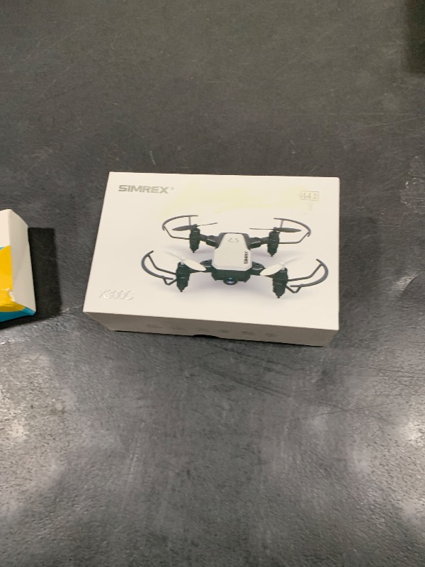 Photo 1 of SIMREX X300C Mini Drone with Camera 720P HD FPV, RC Quadcopter Foldable Drone With Altitude Hold, 3D Flip, Headless Mode, Gravity Control and 2 Batteries, Gifts for Kids, Adults, Beginner